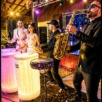 Tambores de LED com Saxofonista